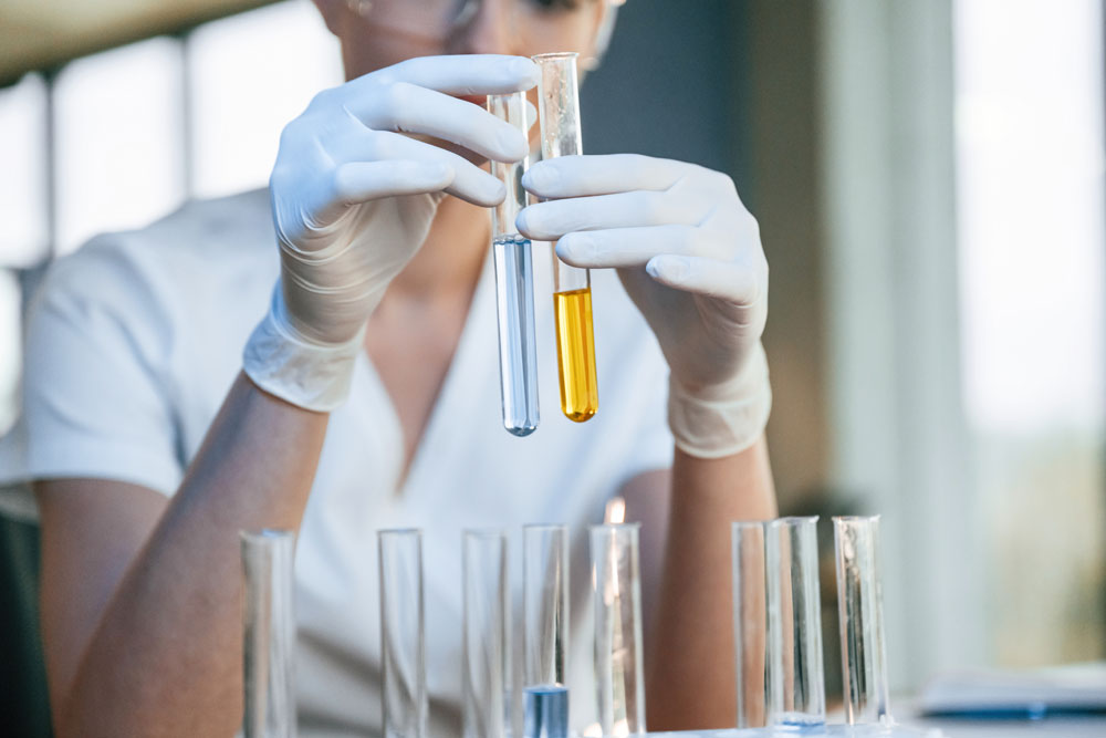 scientist with foreign liquids
